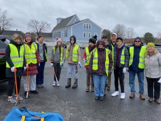 litter collection volunteers posing for a photo