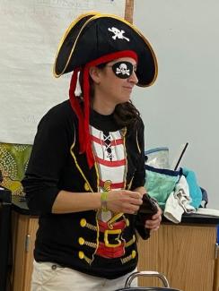 teacher wearing a pirate outfit